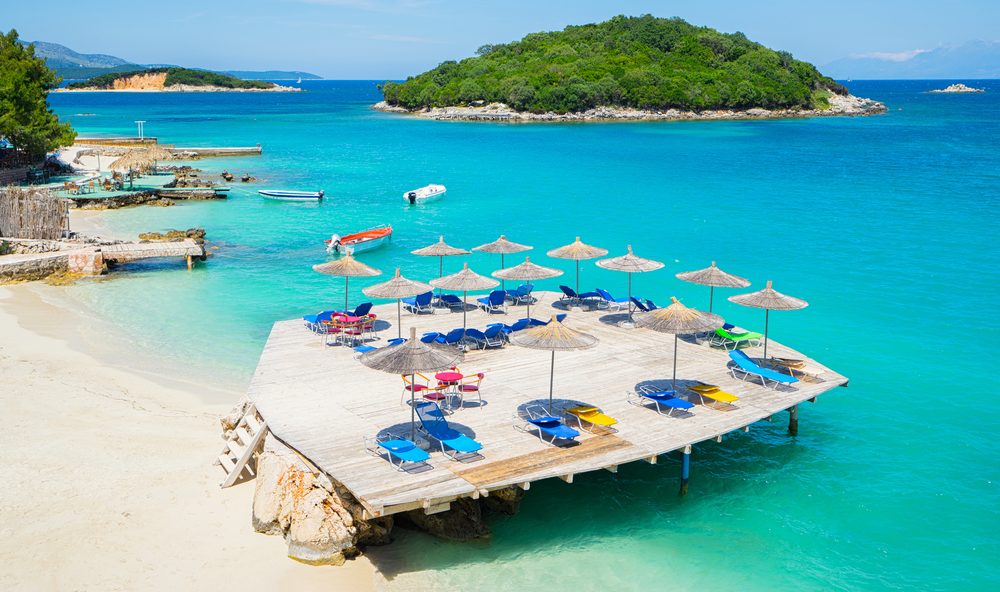 Sunshade,Umbrellas,And,Deckchairs,On,The,Beautiful,Ksamil,Beach,,Albania.