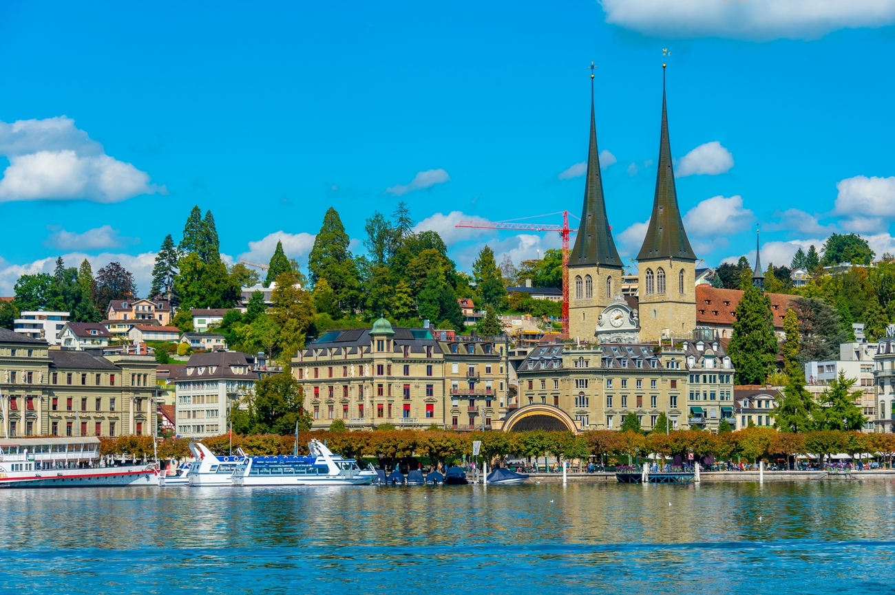 Waterfront,Of,Lake,Lucerne,With,A,Church,In,Luzern,,Switzerland.